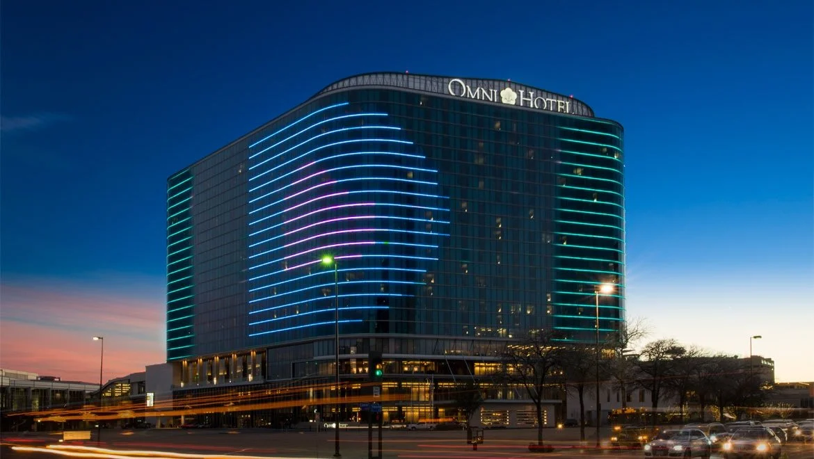 daldtn-omni-dallas-hotel-exterior-sunset.jpg