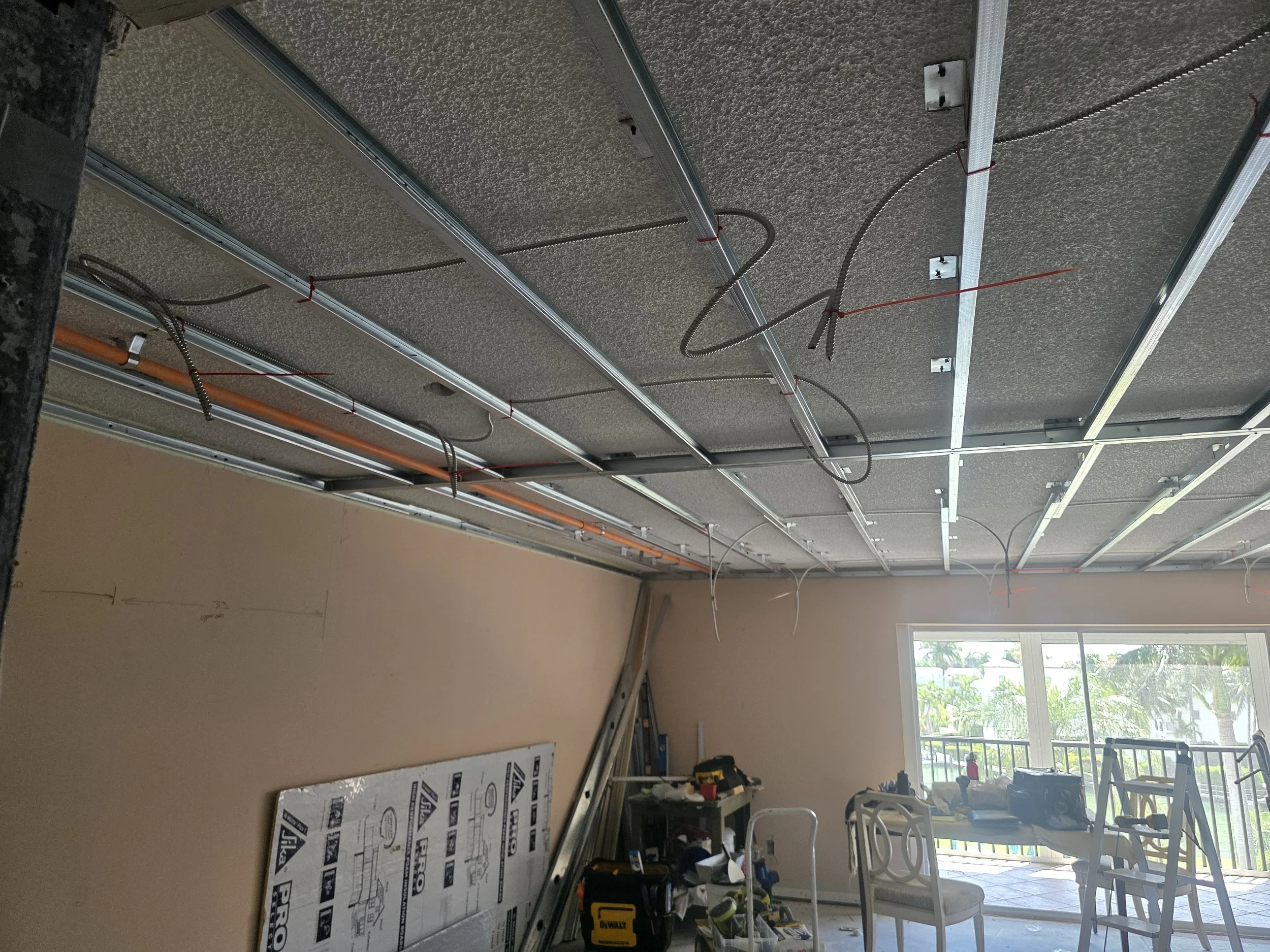 Living room frame down with metal studs. Prep for drywall, new LED lighting