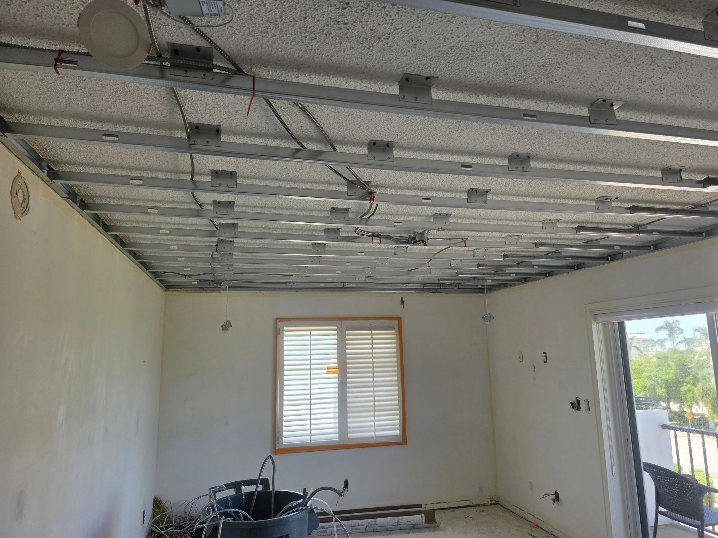 J&LD: Master bedroom - drop down ceiling installed to provide LED lighting.