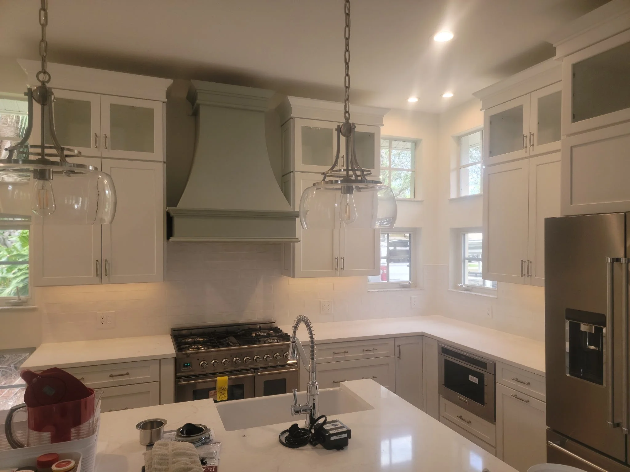 remodel showing the range and refrigerator and microwave.