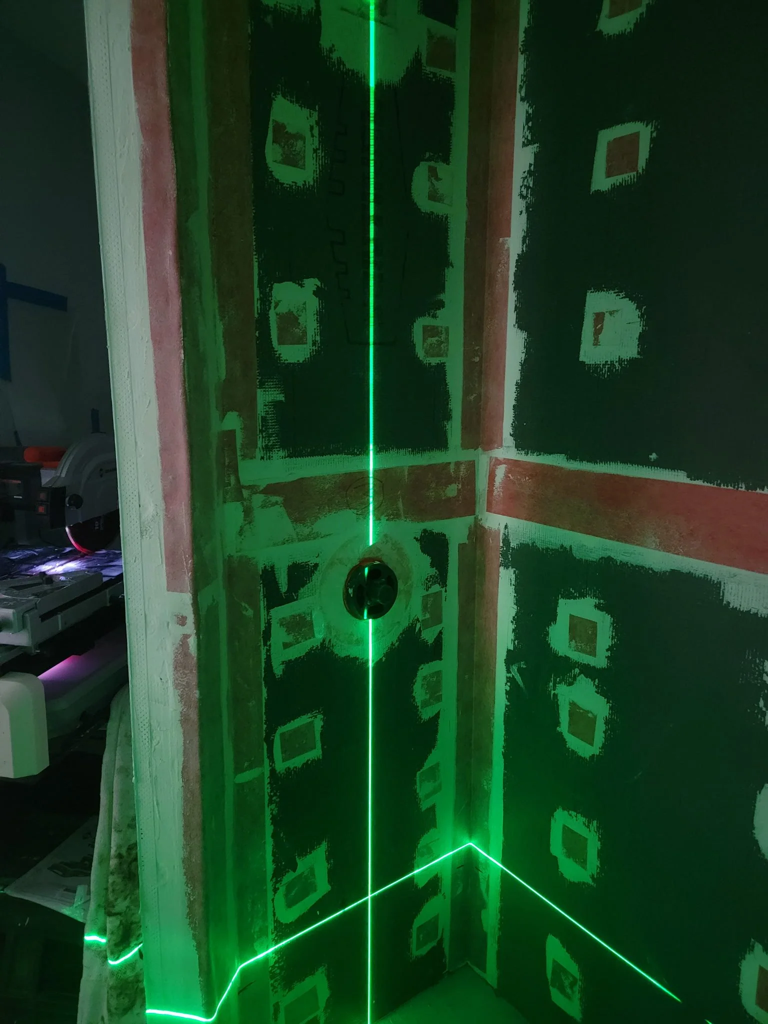 DB - Laser leveling used for setting tile for a perfect job.
