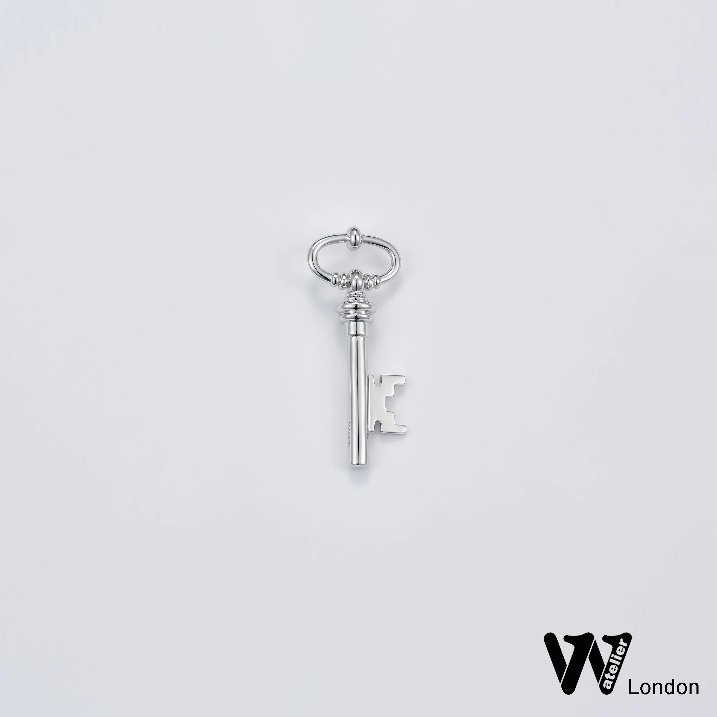 key charm white gold .jpg