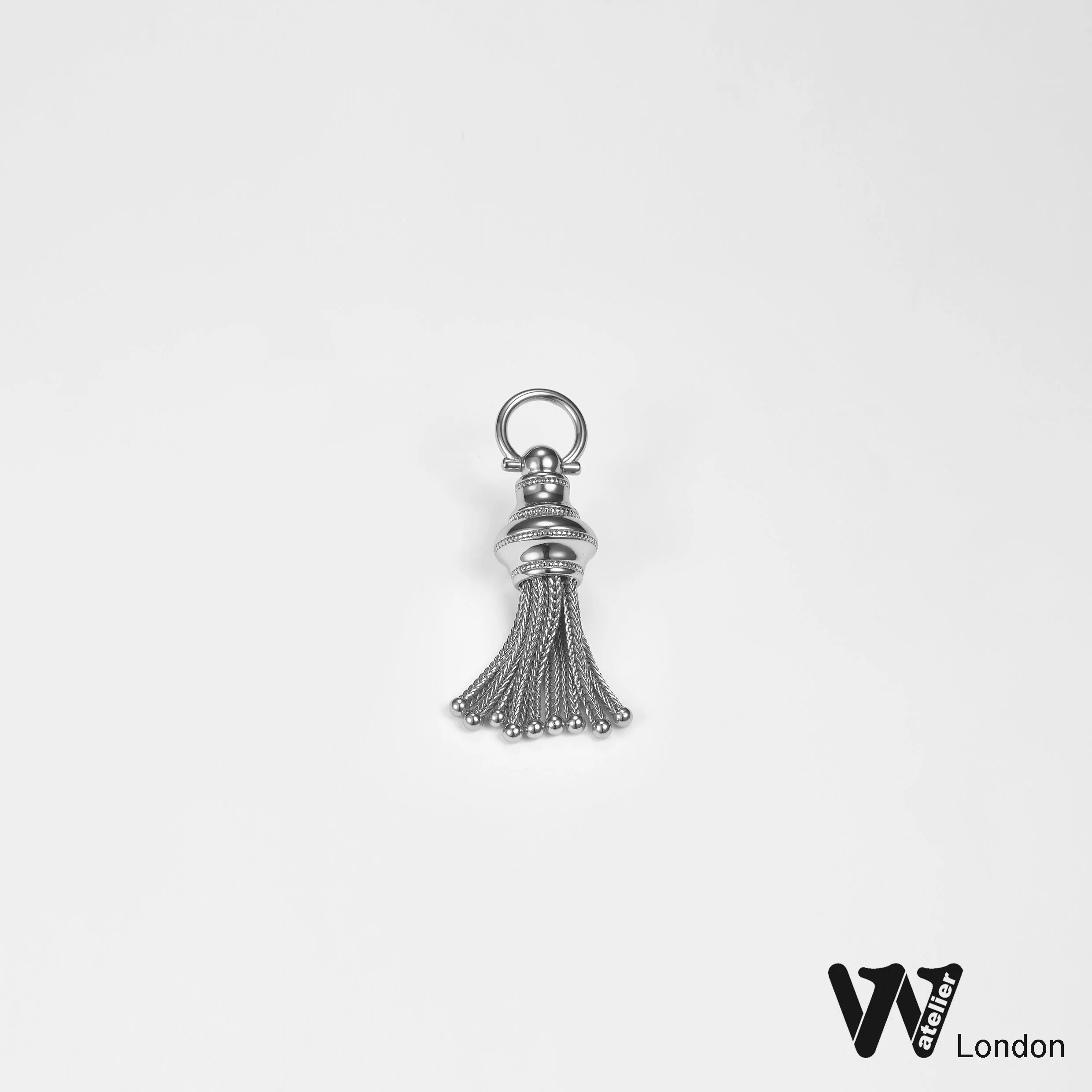 tassle charm  white .jpg