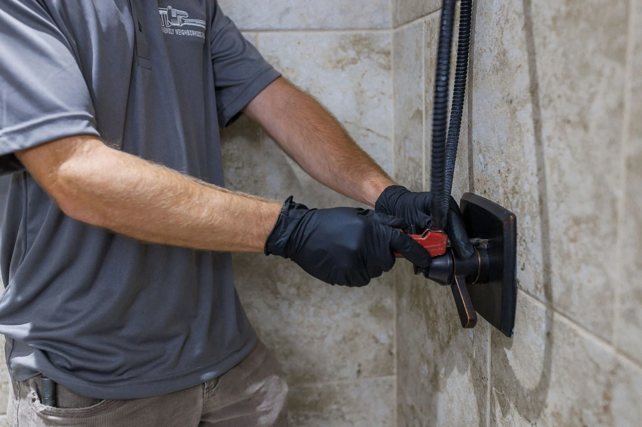 Shower plumbing repair in Knoxville bathroom