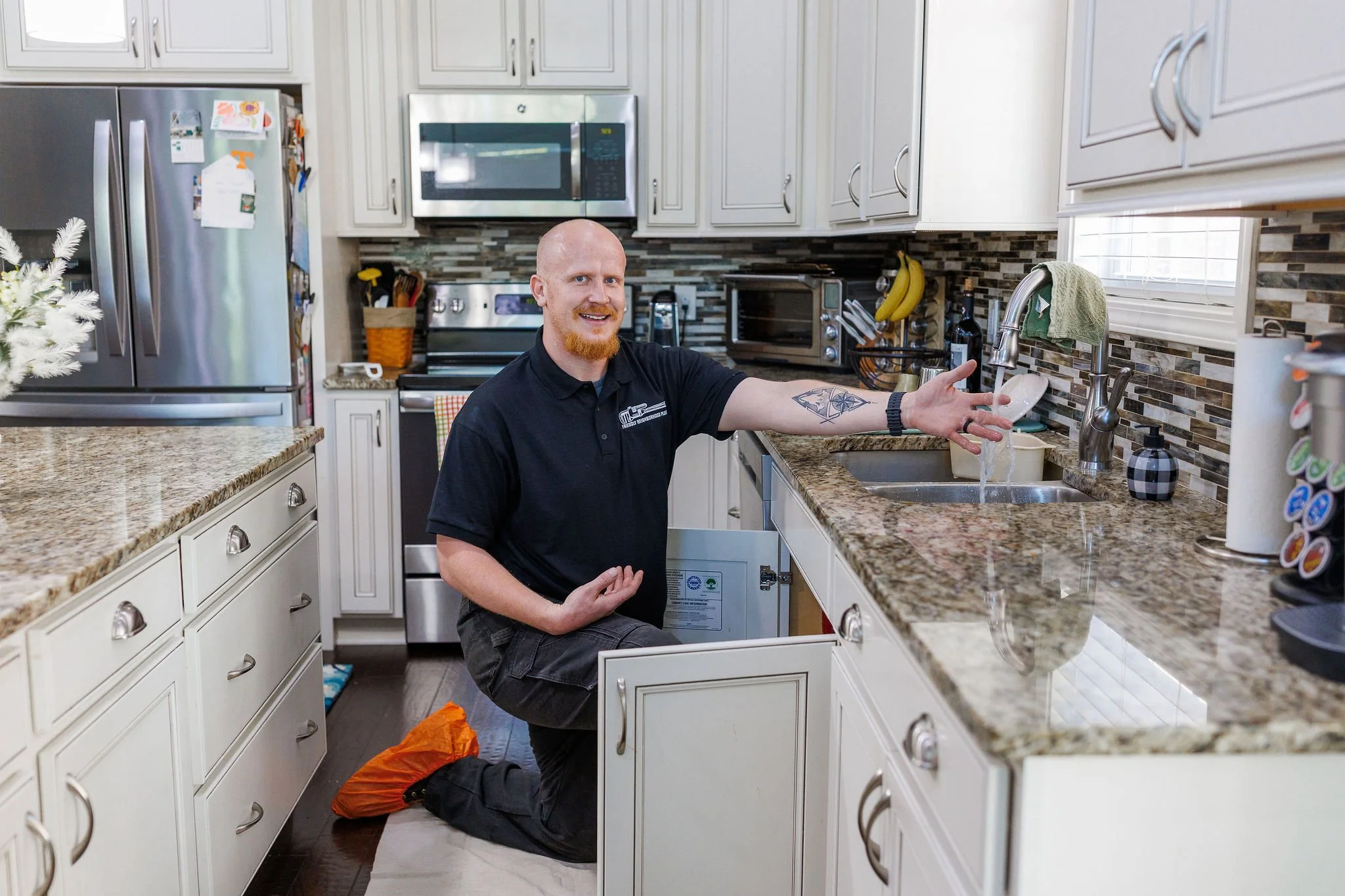 Professional plumbing service inside Knoxville home