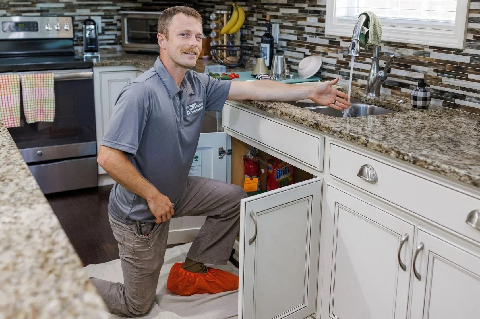 Fixing a kitchen drain clog in Knoxville home