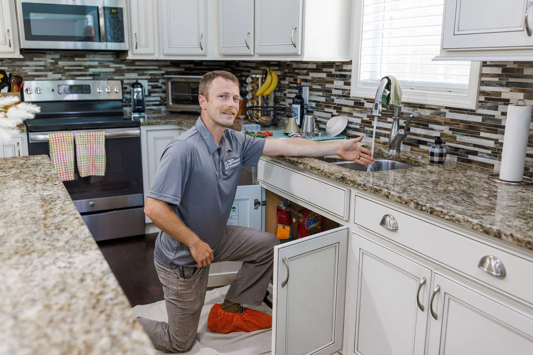 Clearing clogged sink drain in Knoxville home