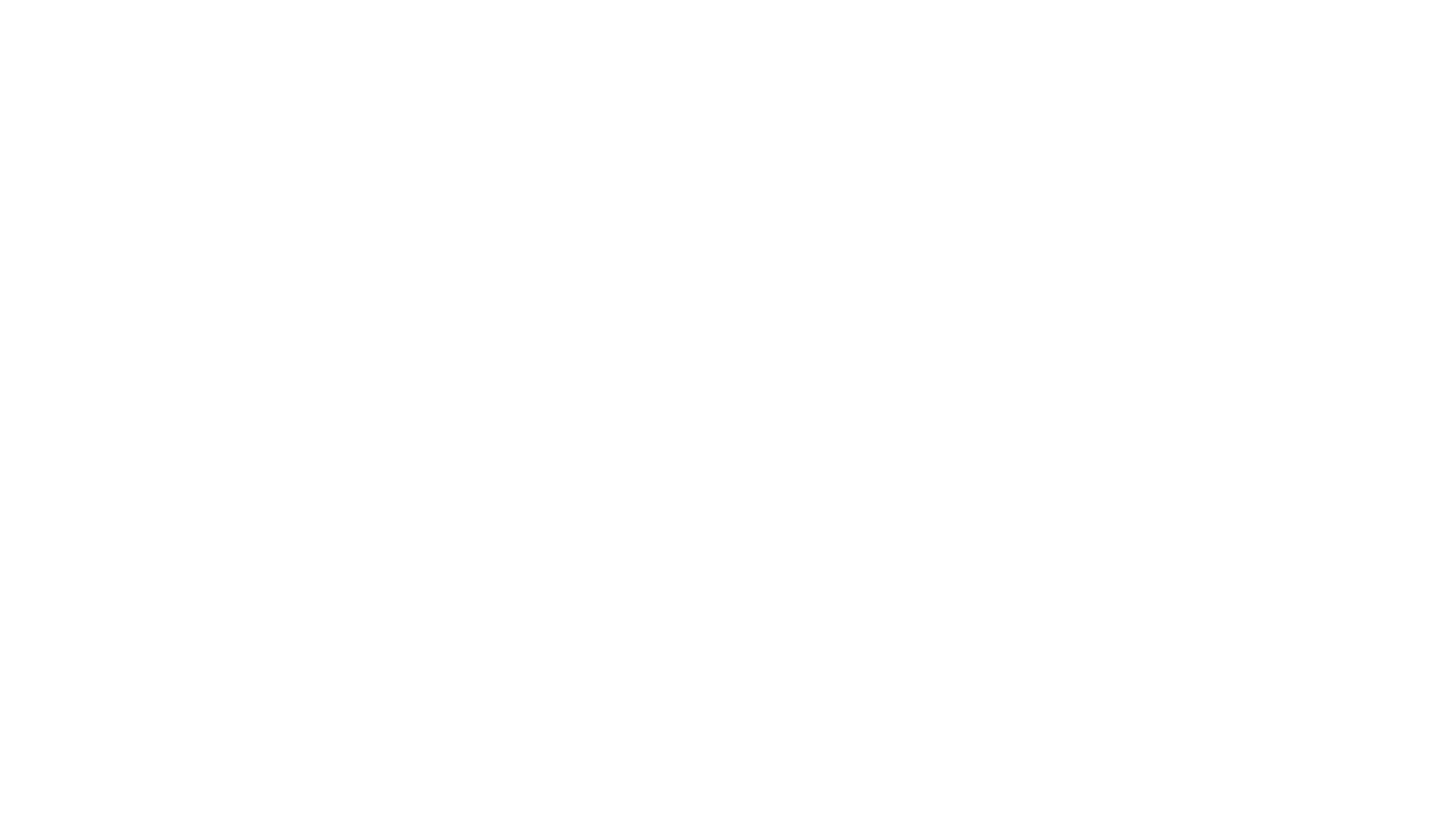 Woman laying across awning to a manhattan skyline.