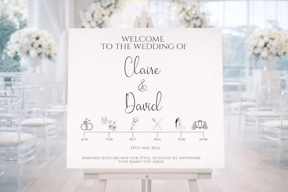 Wedding schedule sign for Claire and David on May 24th, 2026, with icons for rings, photos, singing, eating, and dancing, displayed on a white easel in a decorated reception hall.