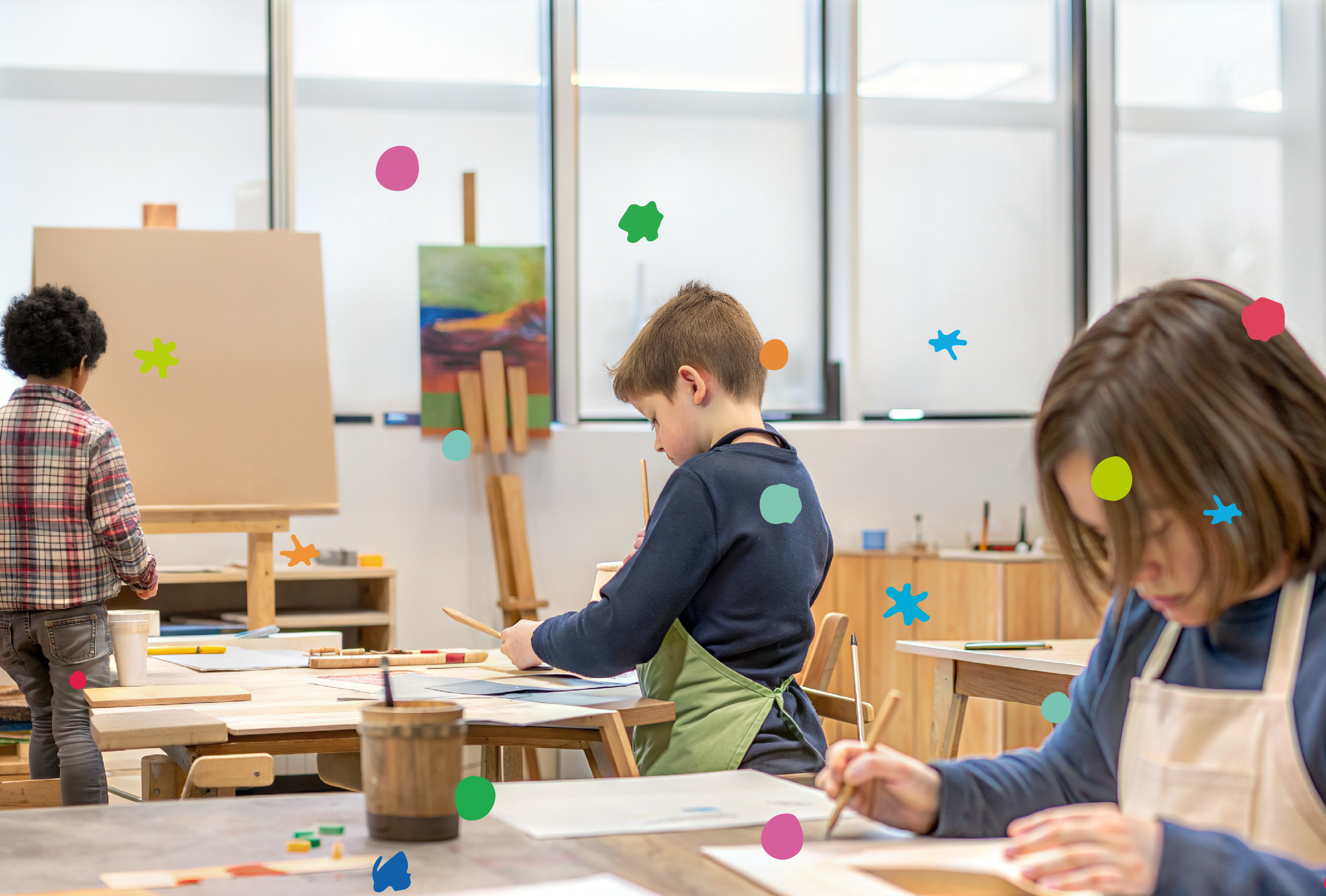 Children working on creative projects at UBABY LAB