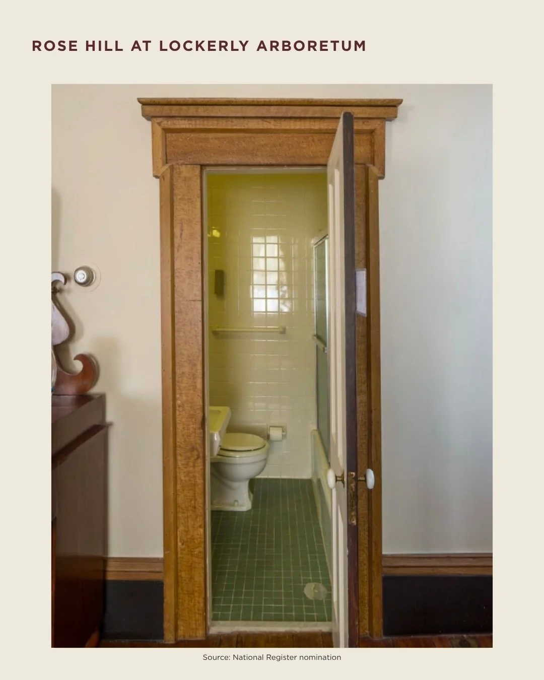 Historic bathroom at Rose Hill showing a narrow doorway, wood trim, and green tile.