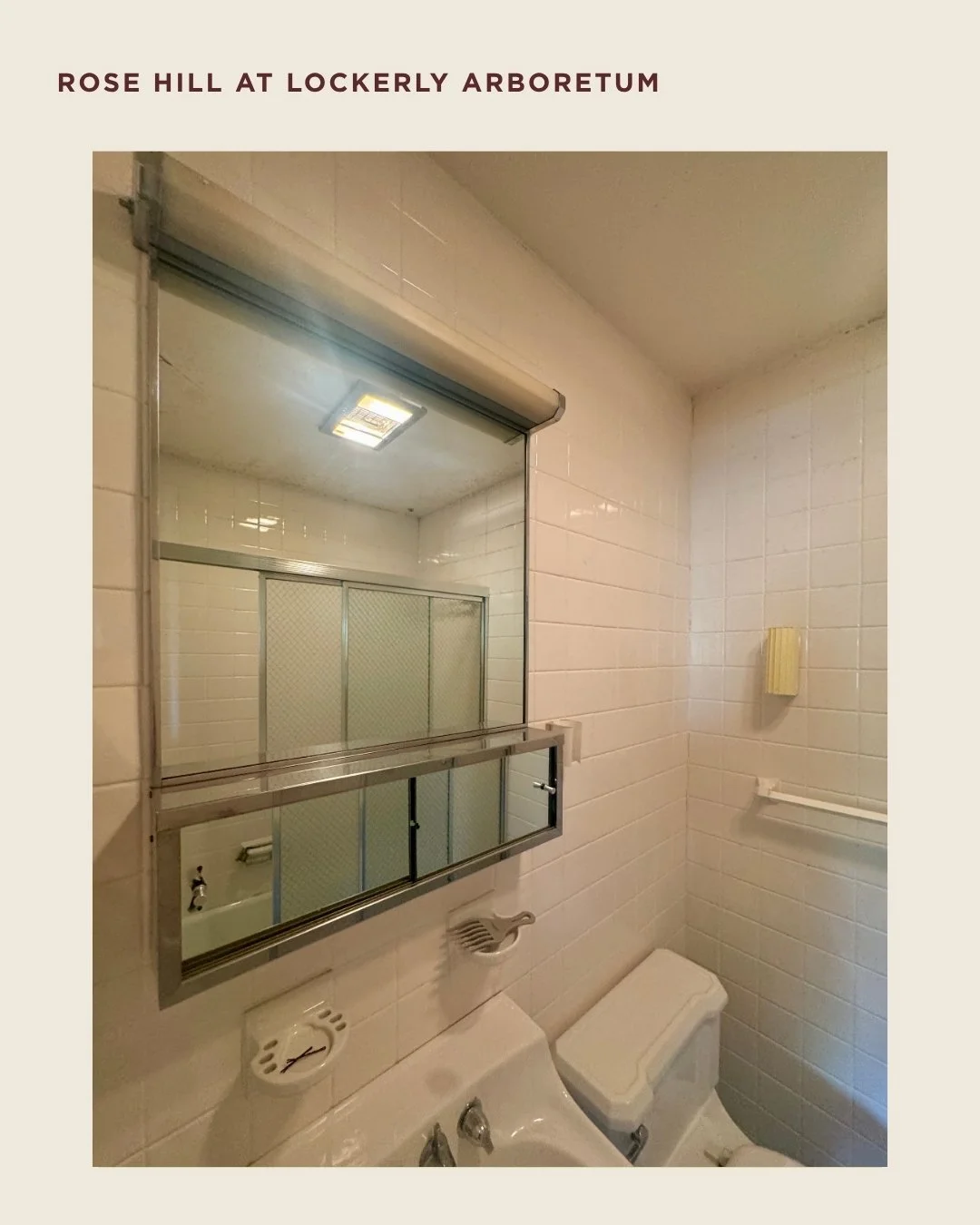 Existing bathroom conditions at Rose Hill showing the sink, mirrored cabinet, and tiled walls.