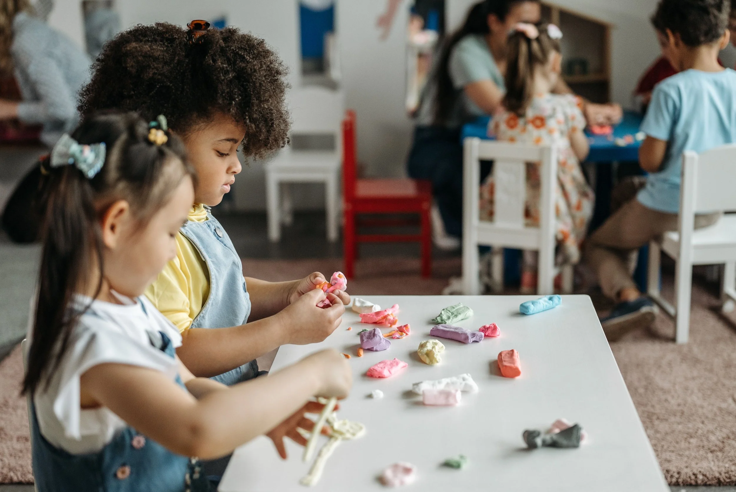 kids playing with clay
