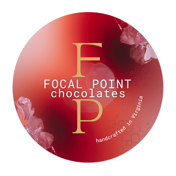 Circular label with a red background, featuring the text "Focal Point Chocolates" and a large "F P" in gold, with "handcrafted in Virginia" written along the right edge.
