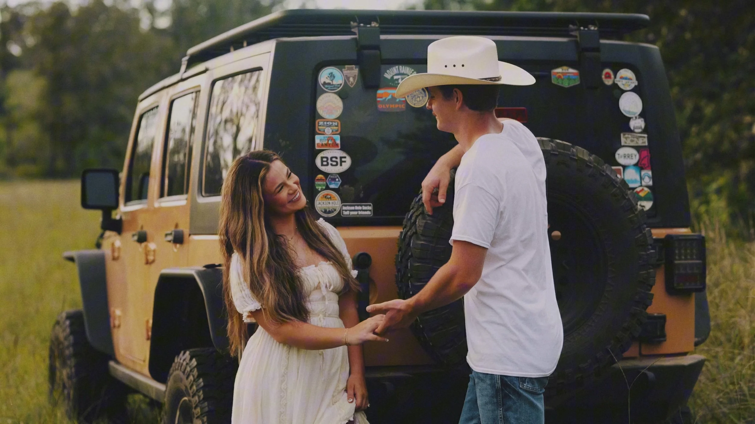 Ali and Dalton had the most fun engagement shoot in a wildflower field in North Mississippi.
