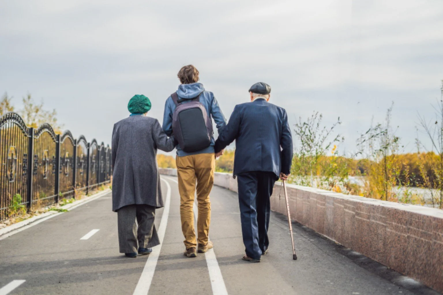Older adults walking outdoors together for mobility and fall prevention support