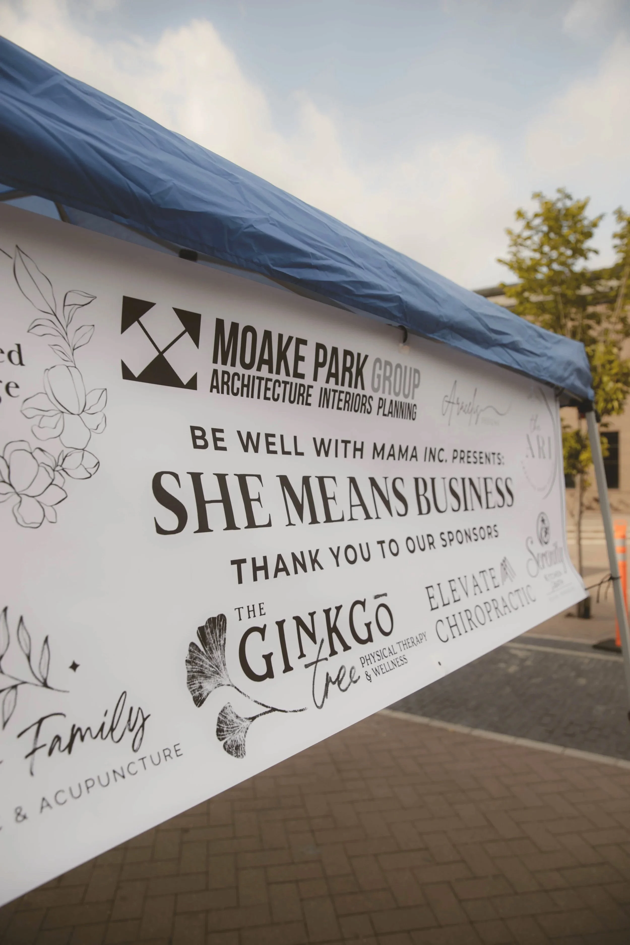 A sponsorship banner from an event that lists different logos