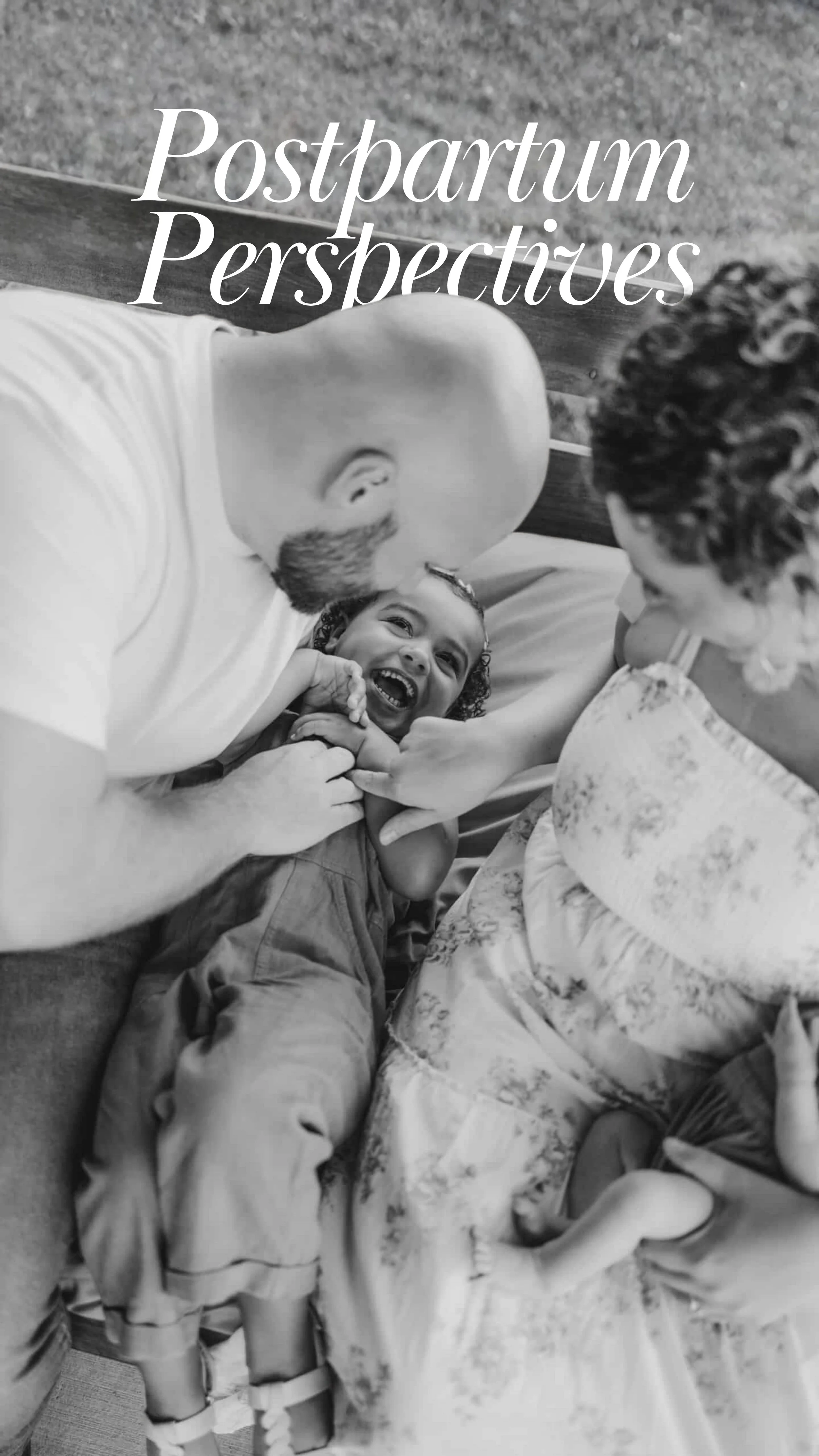 a black and white photo of a mom dad and their daughter laughing