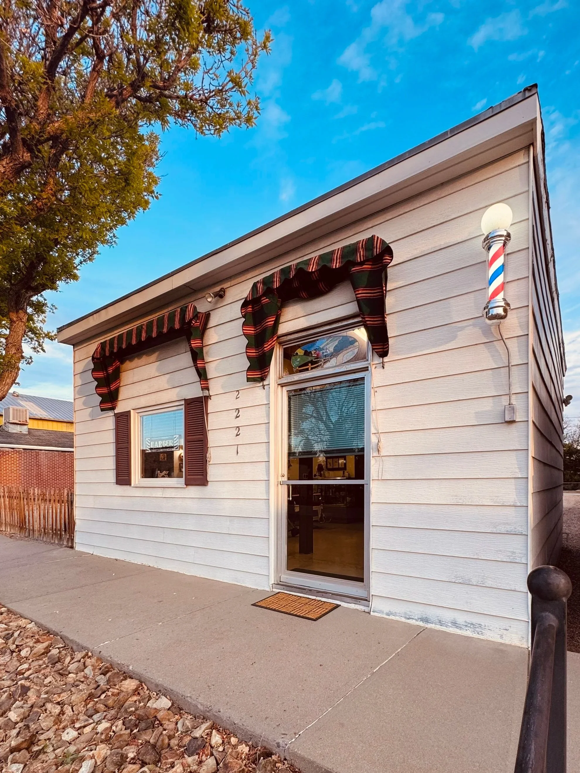 The exterior of Eastlake Barber Shop in Thornton Colorado