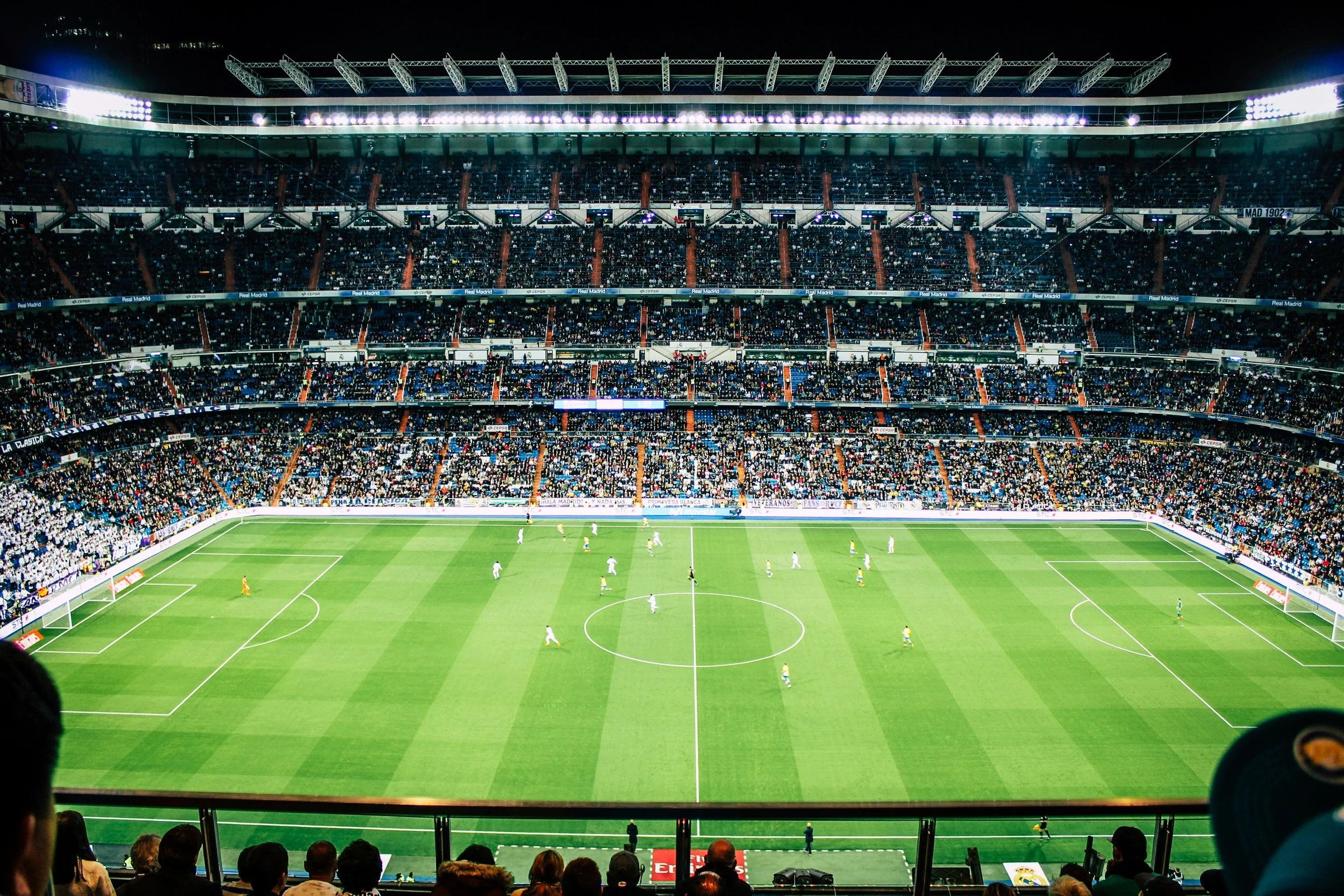Packed stadium using blockchain ticketing to prevent fraud and ensure secure entry