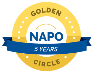 A gold and white circular badge with a blue ribbon banner. The badge reads 'GOLDEN CIRCLE' at the top and '5 YEARS' at the bottom, with the center displaying the word 'NAPO' over a stylized landscape.