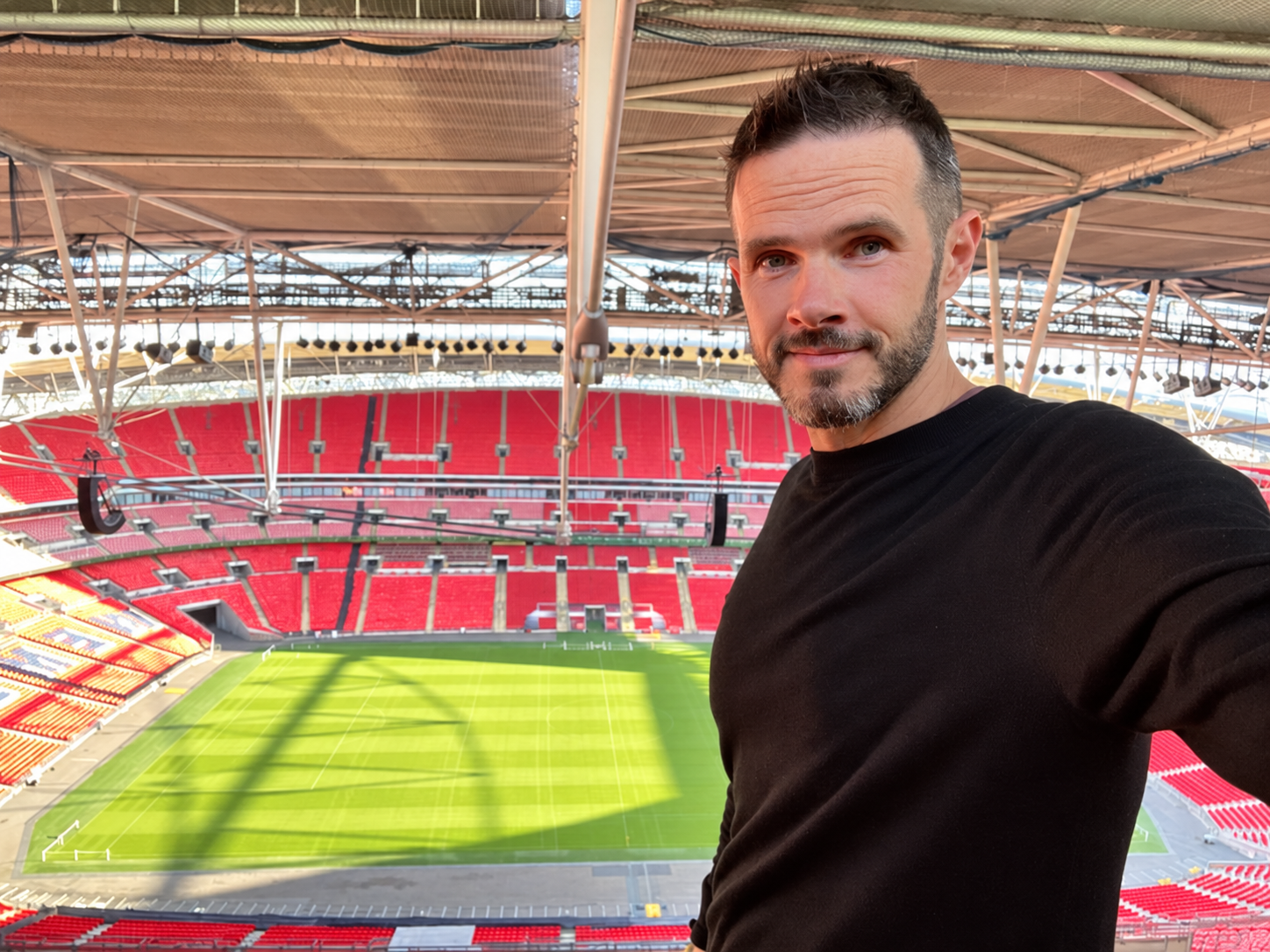 Unmasked Selfie Inside Wembley-Style Stadium.png