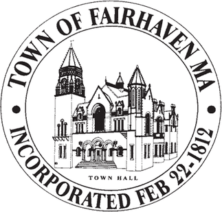 Seal for the Town of Fairhaven, MA, featuring a drawing of Town Hall with a prominent tower, and text indicating incorporation date of February 29, 1812.