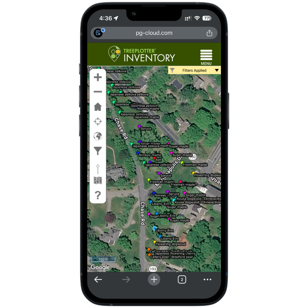 A smartphone displaying a TreePlotter Inventory app with a map of a residential area, showing various trees labeled with species name and location markers.