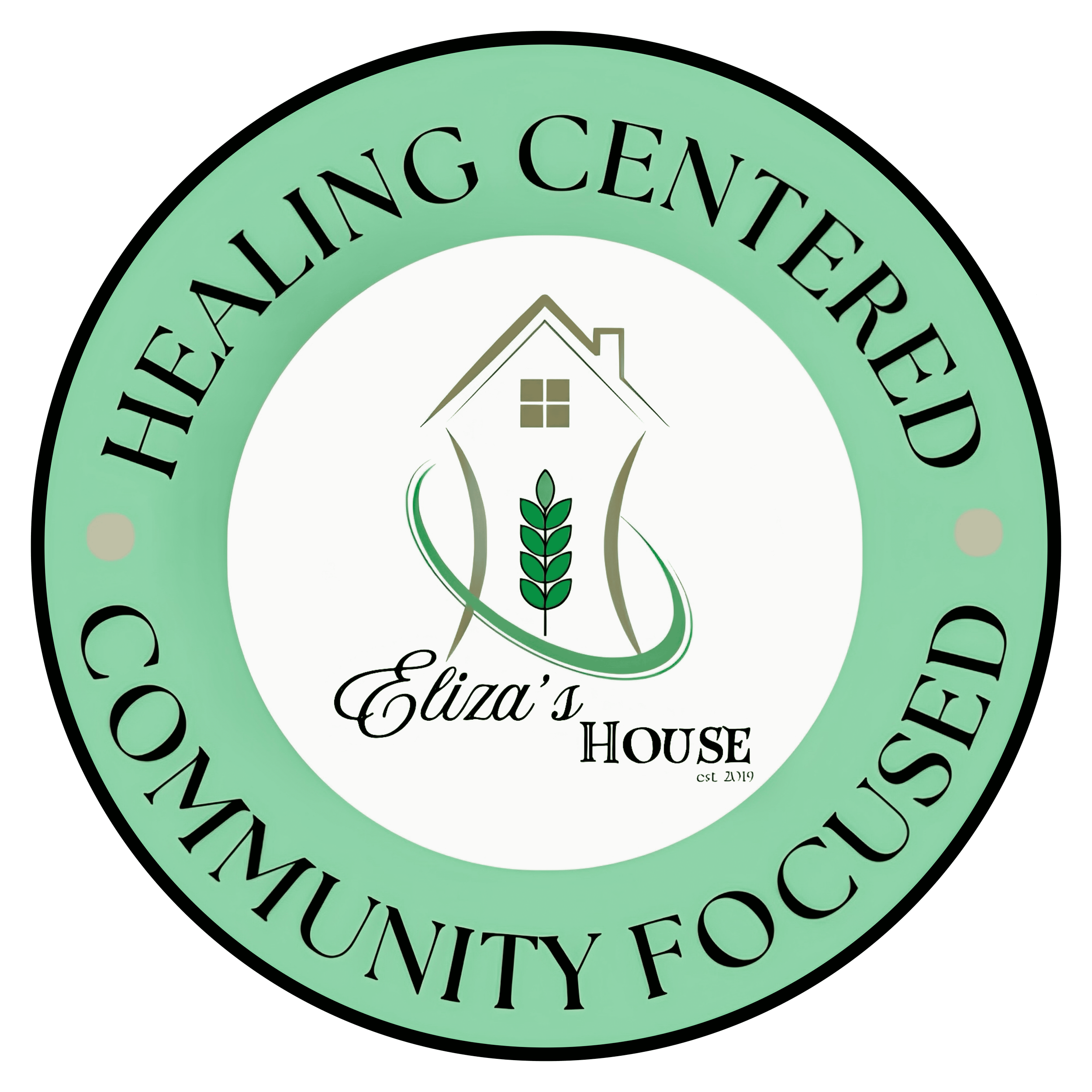 Close-up of a circular logo with the words 'Eliza's House' and other text around the perimeter, featuring a house and plant graphic in the center.