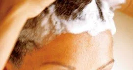 __shampoowoman-washing-hair-1216631761.jpg
