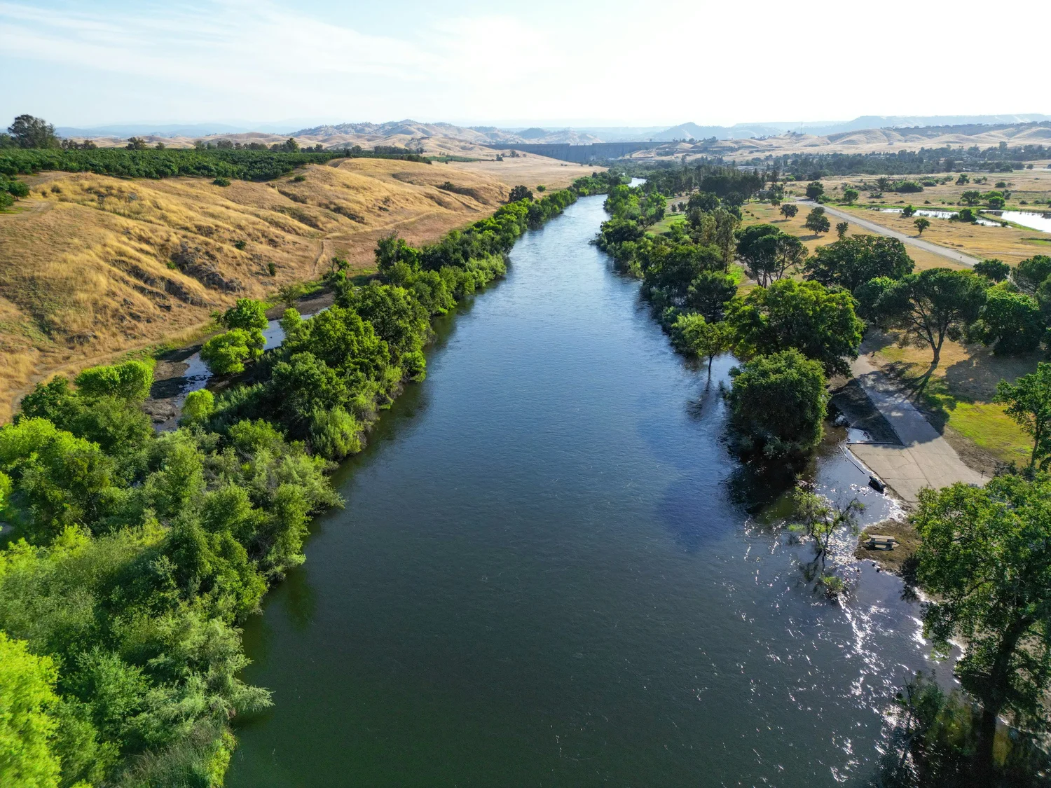 A river running through California agricultural land