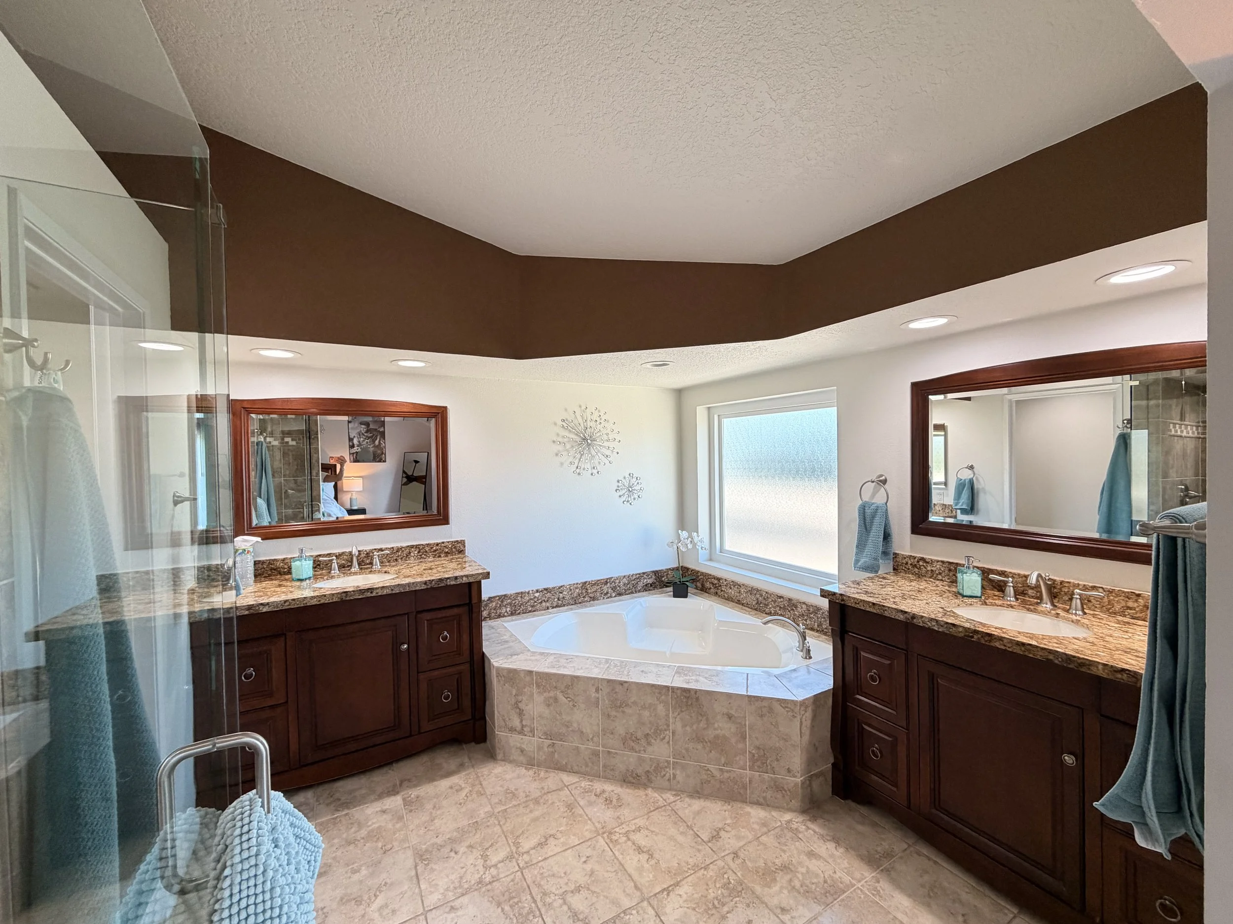 Primary Bathroom with tub and shower