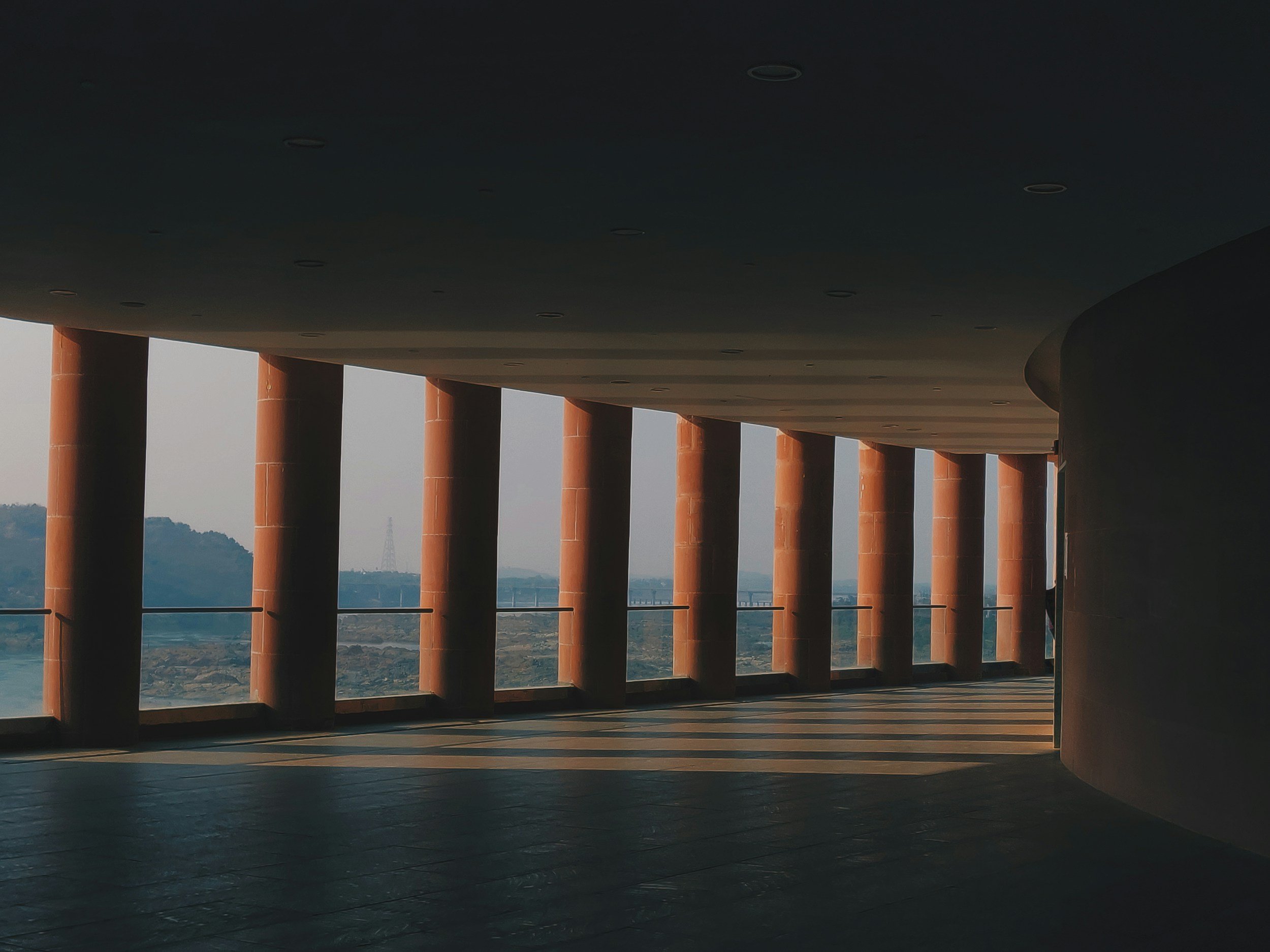Image of pillars overlooking a distant view.  Symbolising the pillars that will be built in order to reach the end goal of your project,