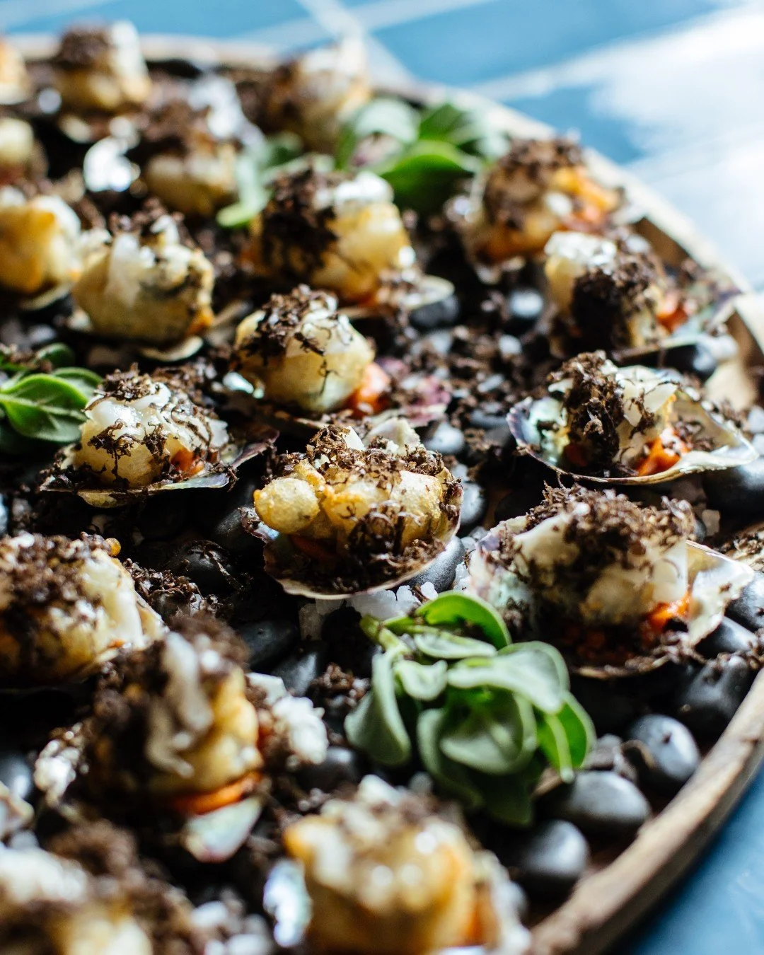 Selection of canapés on a tray for a Studio Cibo private dining event