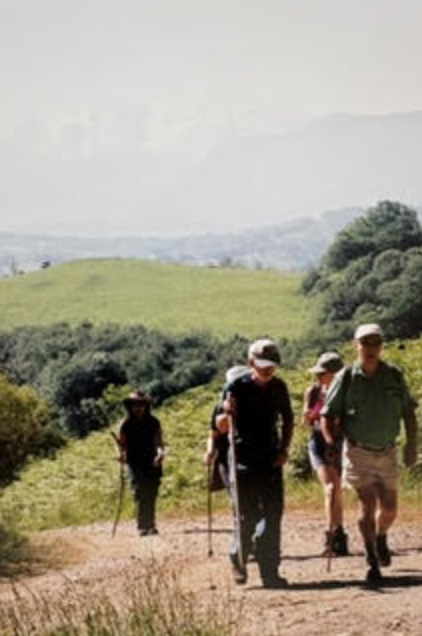 Group walking through the Pyrenees Mountains in France during the founder’s life coaching training.