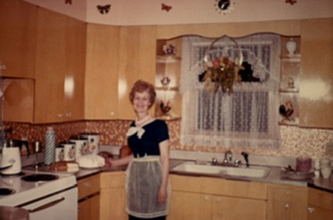 Grandma Marie standing in her kitchen, reflecting the family roots and love of home behind Compassionate Decluttering.