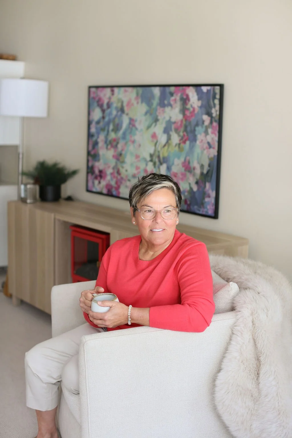 Michelle Hoff, decluttering coach, sitting in a home while teaching the ALIGN Method