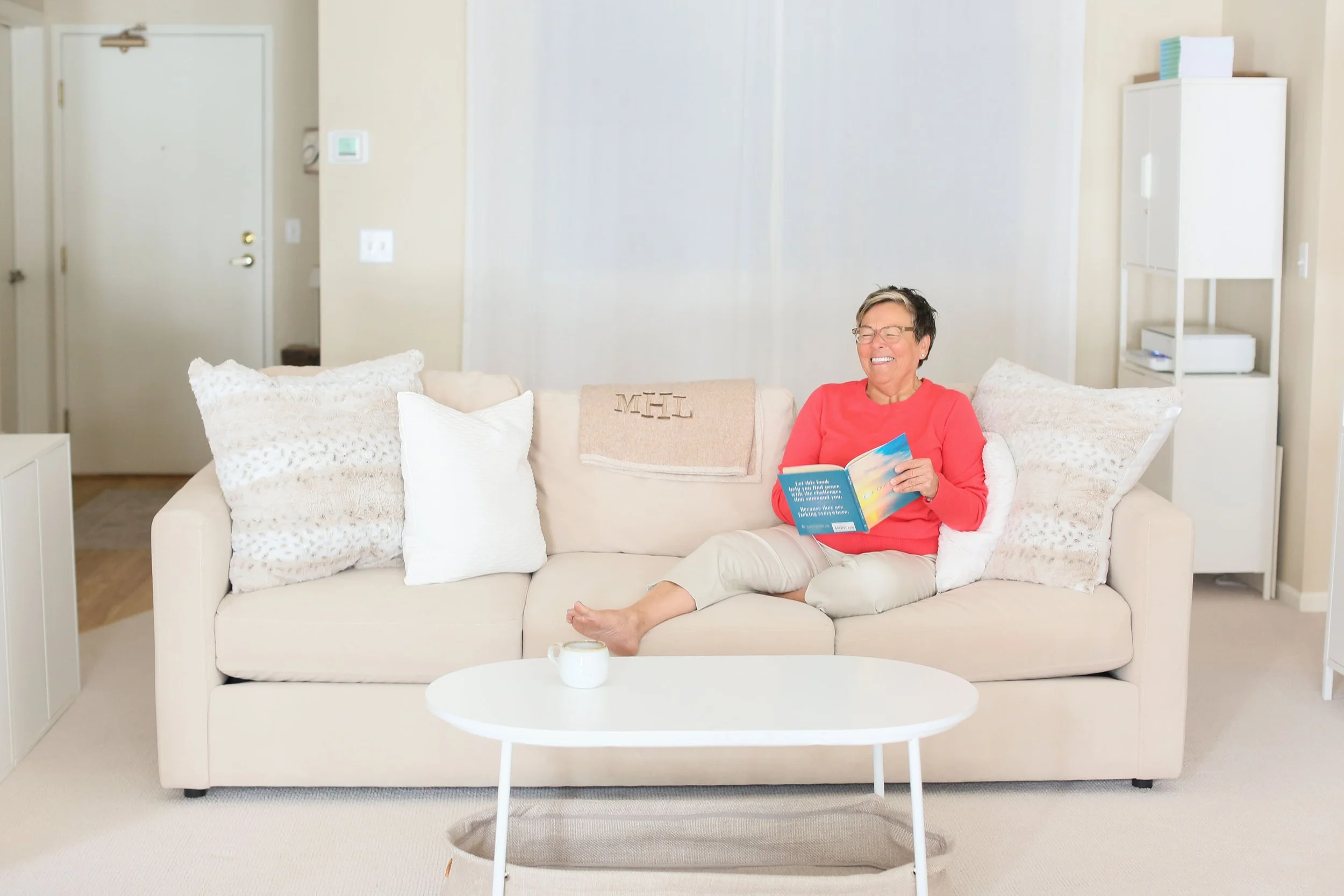 Michelle Hoff sitting in a calm home for the Nurture Your New Way of Living step