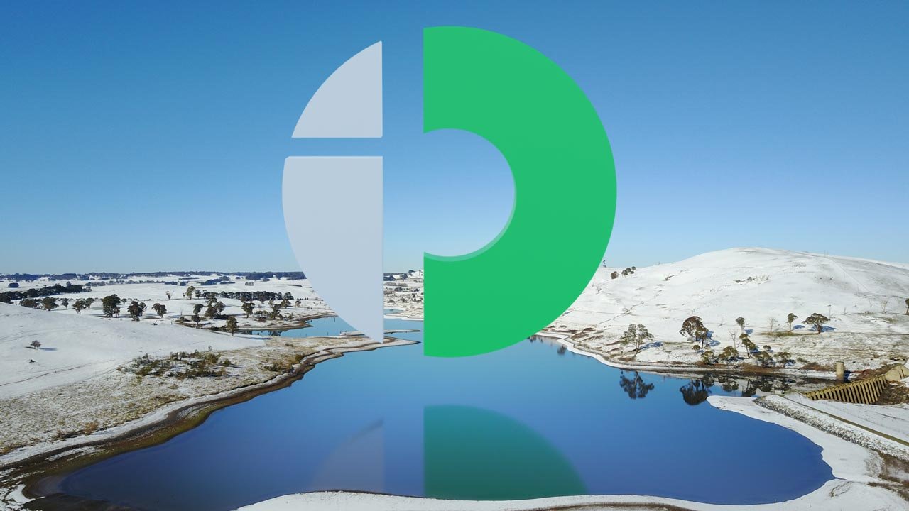 The Lutra ID logo hovering above a lake