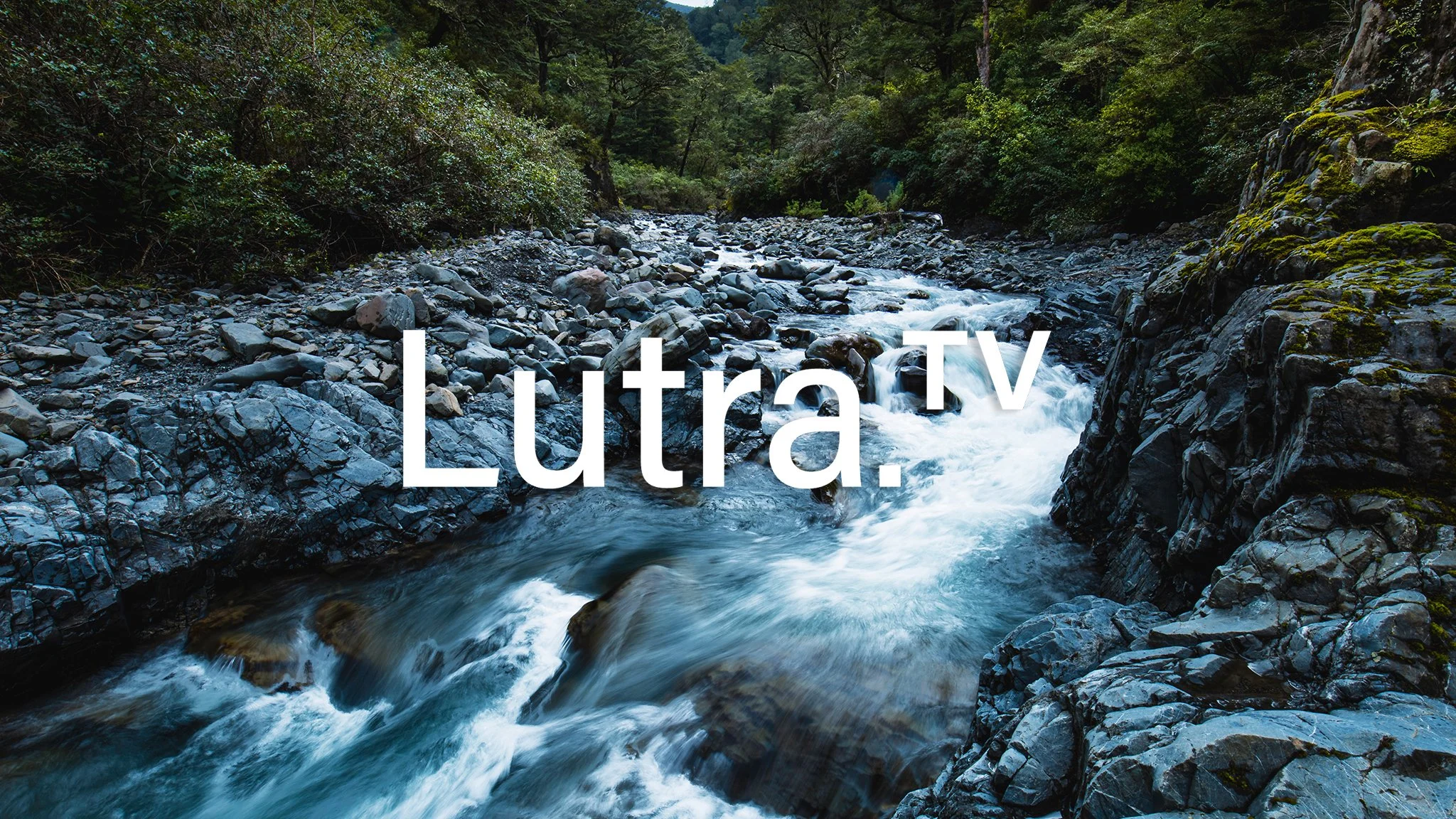 The Lutra TV Logo above a river