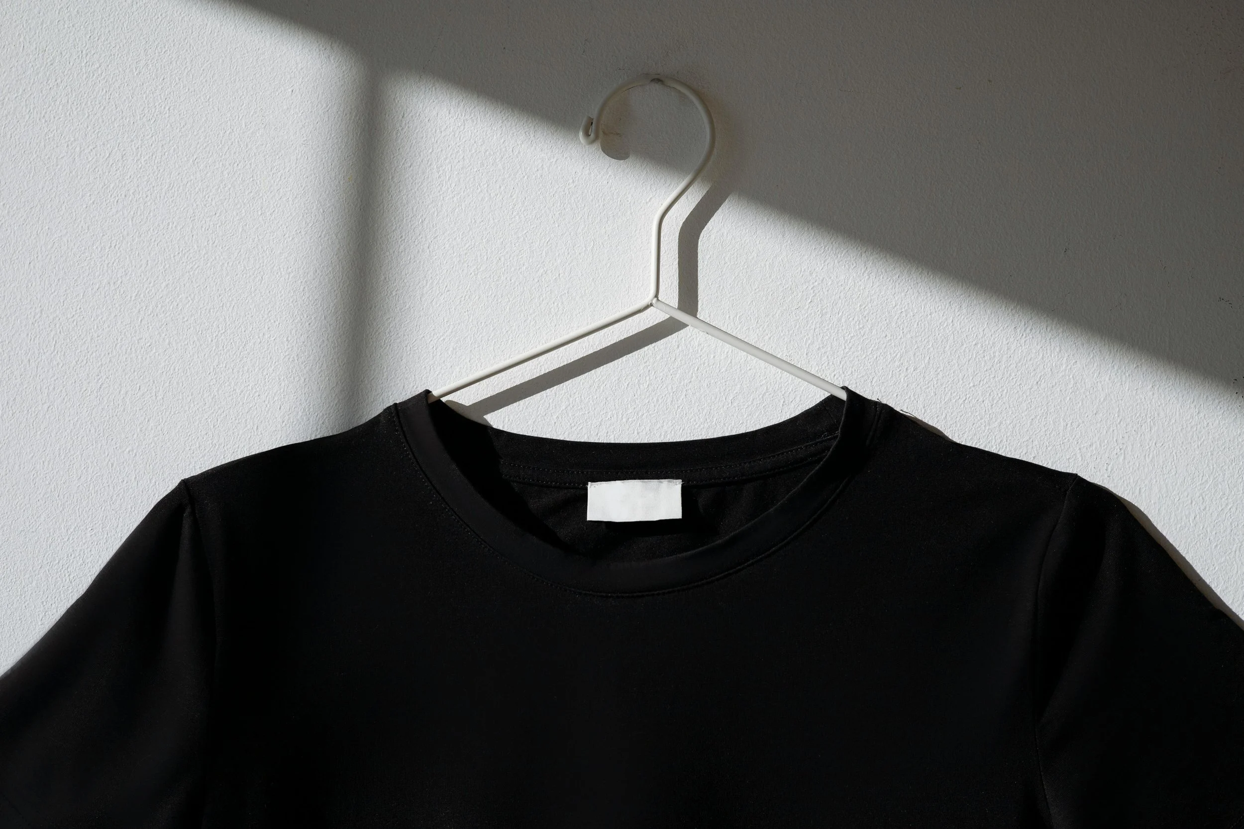 Black t-shirt mockup for custom apparel printing by Inkstyles & Threads.