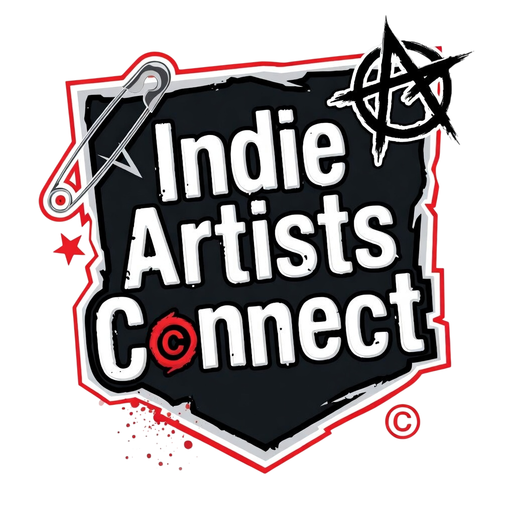 A logo for Indie Artists Connect with a black shield shape, white outlined text, a safety pin at the top left, a pentagram at the top right, and a red target symbol inside the letter 'o' in 'Connect', on a red background.