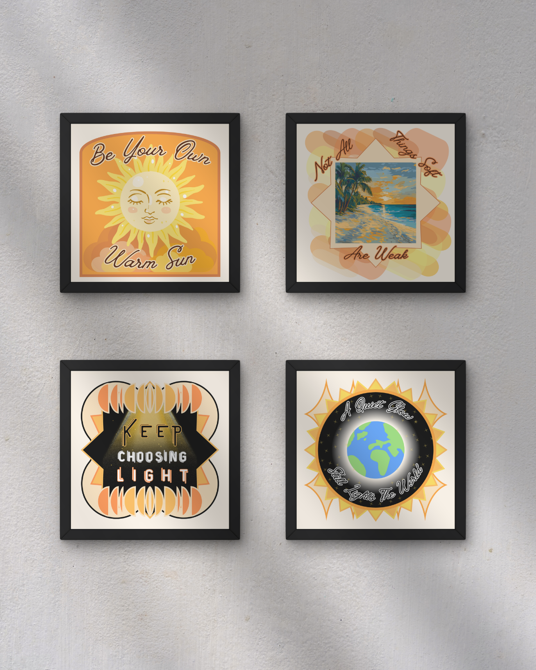 Four framed posters on a wall with motivational and nature themes. The top left poster features a sun with a face and the text 'Be Your Own Warm Sun'. The top right shows a beach scene with the quote 'Not All Who Wander Are Weak'. The bottom left displays a graphic with the words 'Keep Choosing Light'. The bottom right has an earth globe with the phrase 'A Quiet Glow Ed Lights The World'.