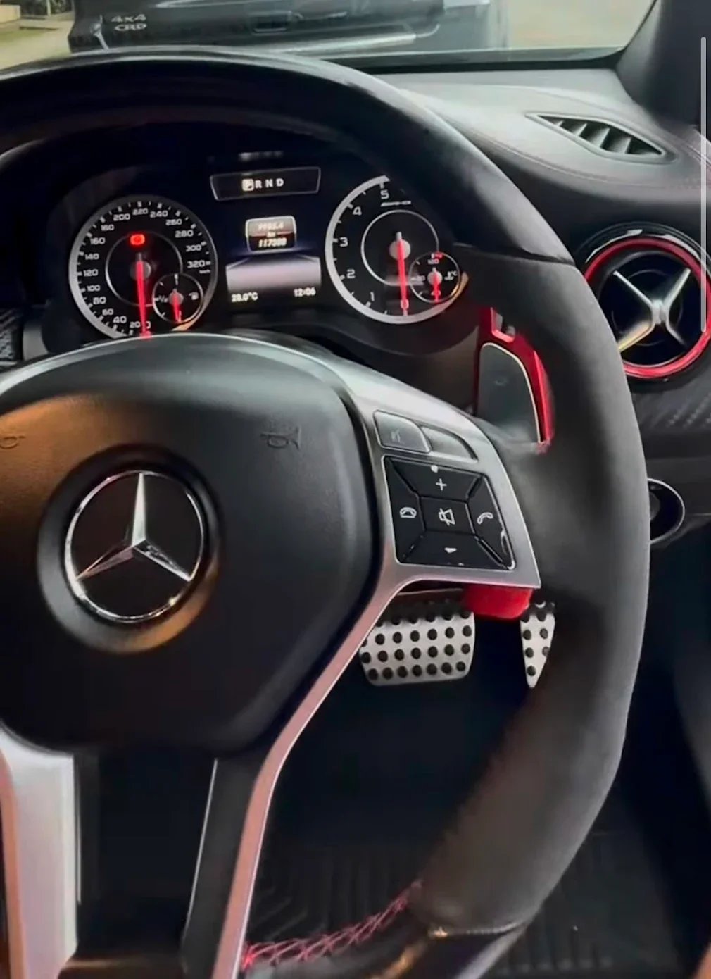 Close-up of a newly detailed steering wheel showing a clean, refreshed interior finish after professional car detailing.