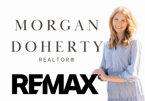 A woman with blonde hair wearing a blue and white striped blouse, smiling, standing next to text that says 'Morgan Doherty Realtor® RE/MAX'.