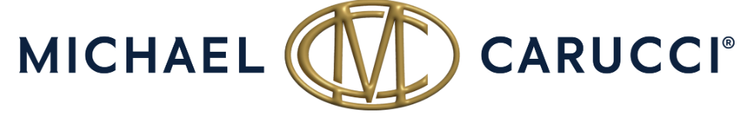 Logo with text 'MICHAEL CARUCCI' and a circular monogram in gold featuring intertwined initials 'M' and 'C'.