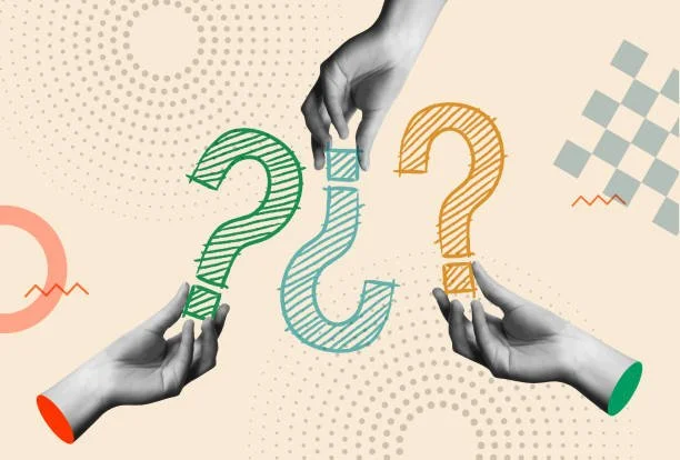 Three black-and-white hands holding colorful question marks in green, blue, and yellow on a modern abstract background with geometric shapes.