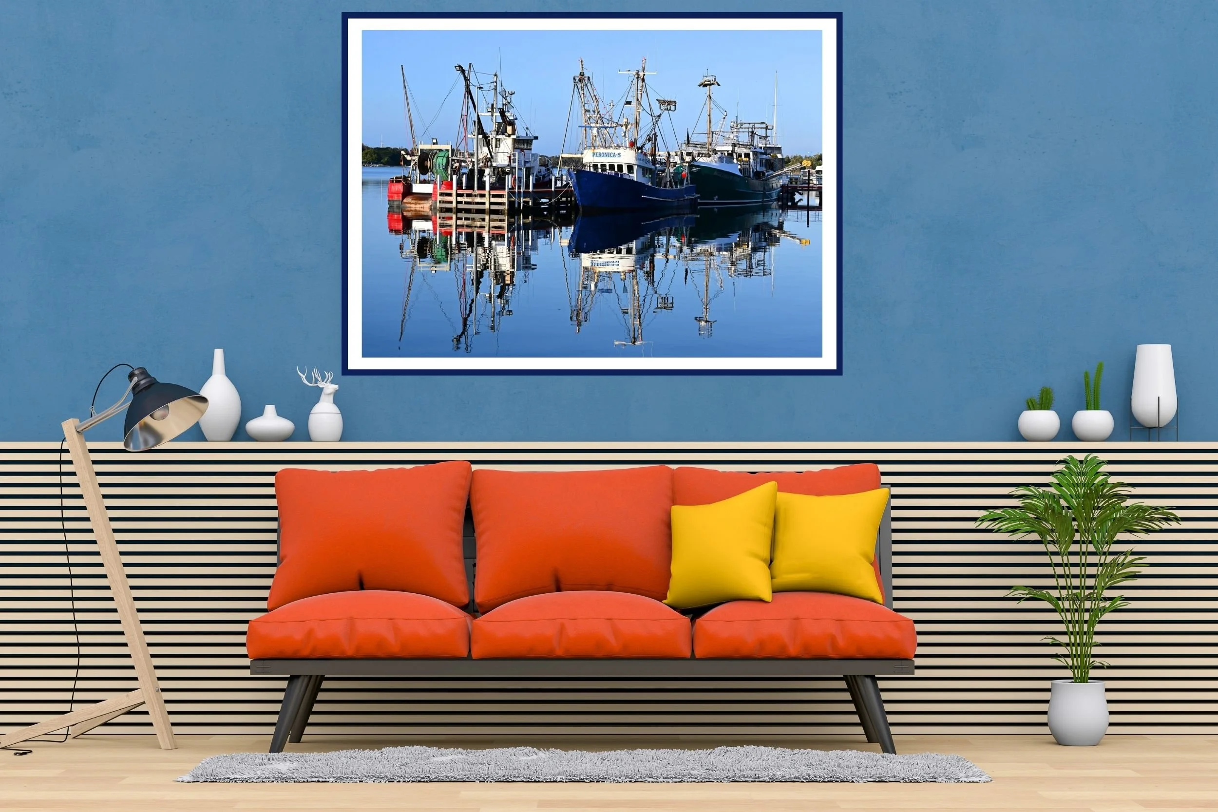 A serene sunlit harbour scene featuring fishing boats and mirror-like reflections on calm water at Lakes Entrance, Victoria Australia.