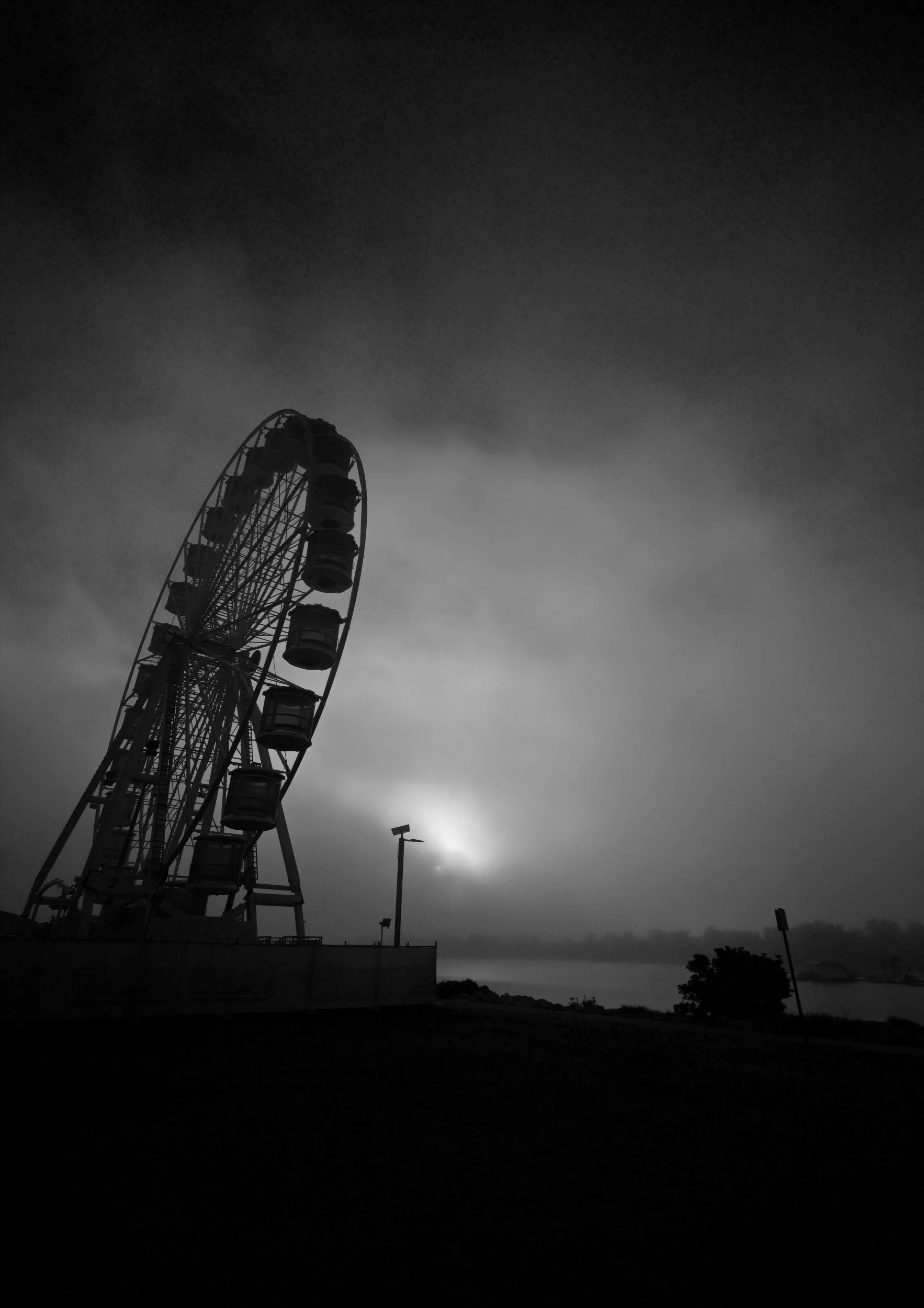 Ferris Wheel in The Morning Fog