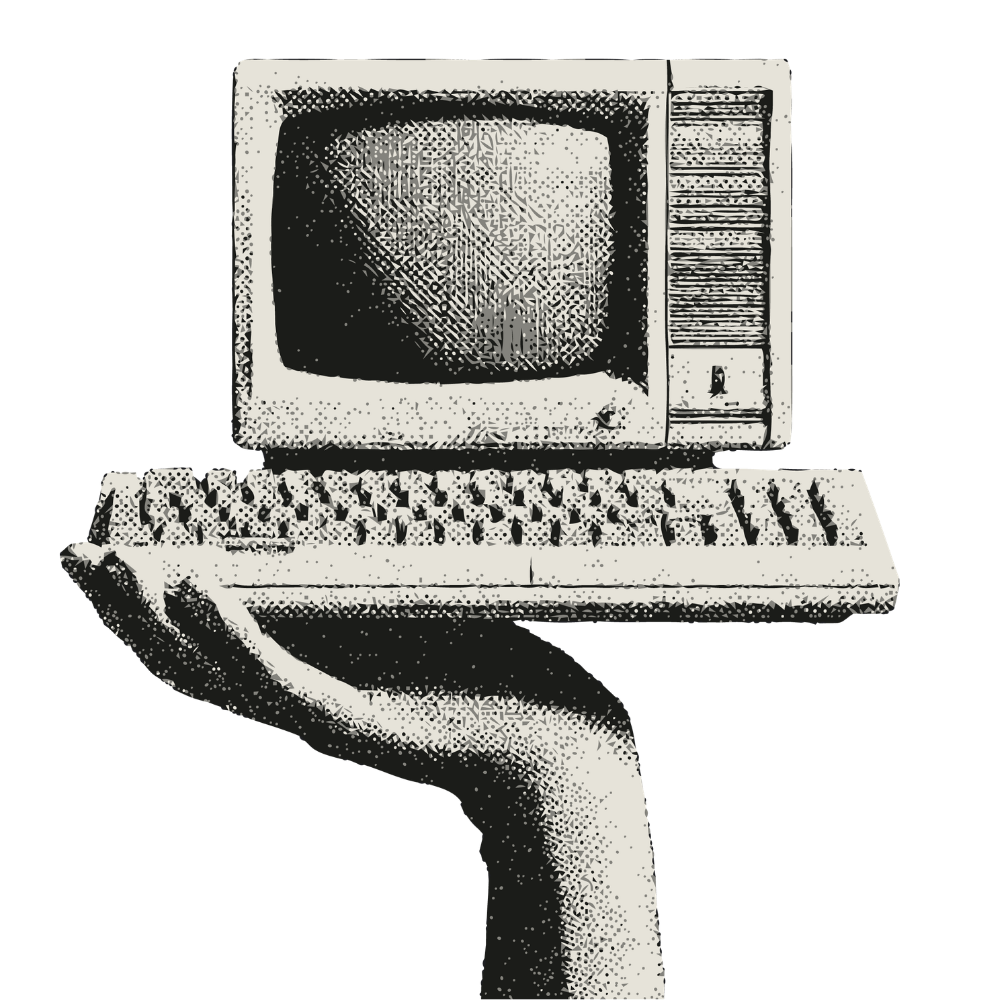 A hand holding a vintage desktop computer with a monitor, keyboard, and mouse.